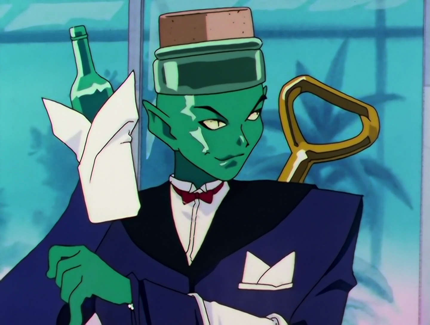 Sailor Sommelier, a Phage from Sailor Moon episode 184. He’s a very, very green man in a dinner jacket. The top of his head resembles a large cork in a wine bottle, and he has a huge bottle opener on his back. Also one of his arms just sort of ends in a wine bottle. Like, he’s not holding the bottle, the bottle is his hand.
